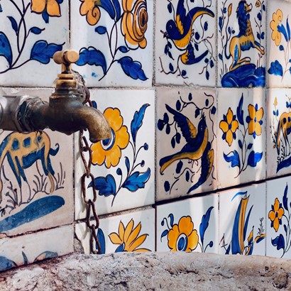 The beautiful stone sink, weathered by time, stands as a testame