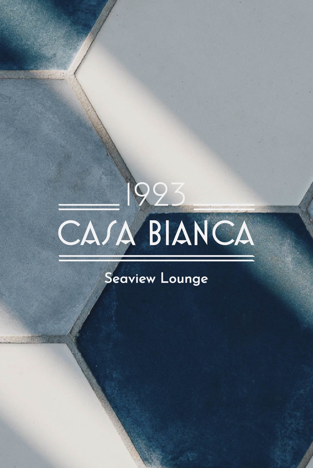 Logo 1923 Casa Bianca sul pavé esagonale in stile moresco del rooftop